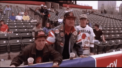 Man In Cleveland Baseball Jersey Standing In Stadium GIF