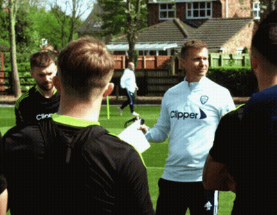 Man In Clipper Shirt Talking To Group GIF