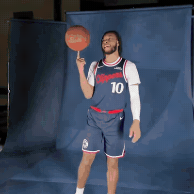 Man In Clippers Jersey Holding Basketball On Finger GIF