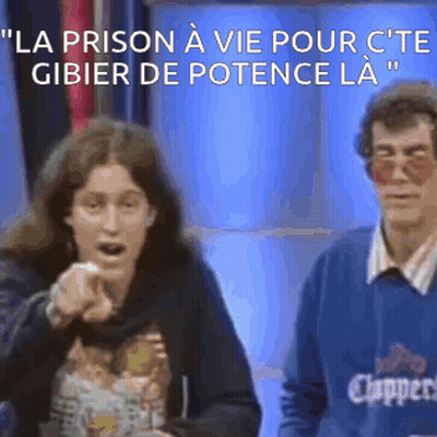 Man In Clippers Sweater Next To Pointing Woman GIF