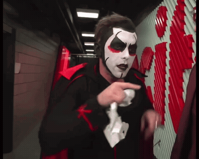Man In Clown Costume Holding Wii Remote GIF
