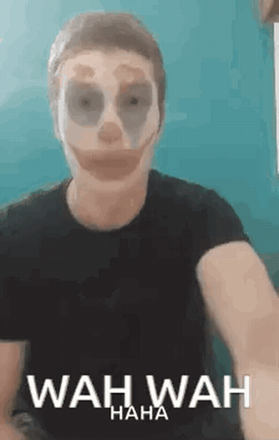 Man In Clown Mask Taking Selfie Saying Wah Wah Haha GIF