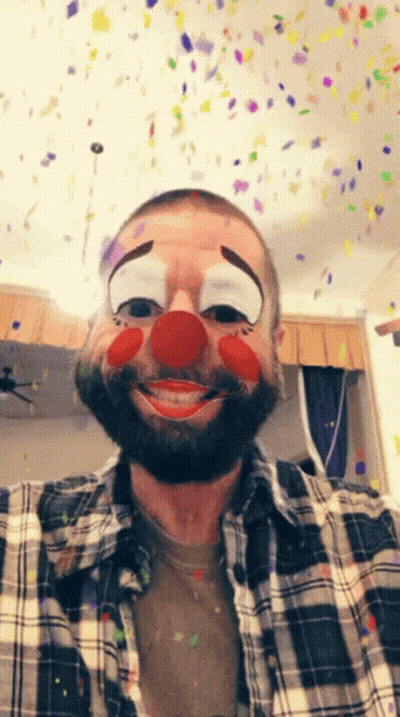 Man In Clown Mask With Confetti Falling GIF
