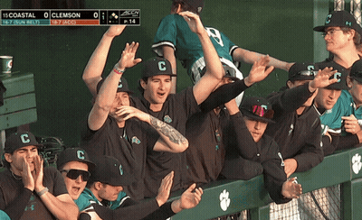Man In Coast Baseball Uniform Holding Bat GIF