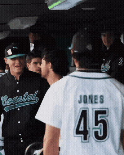 Man In Coastal Jersey Talking To Another Man GIF