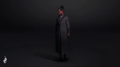 Man In Coat And Tie Holding Wand In Dark Room GIF