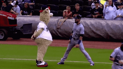 Man In Colorado Rockies Jersey Stands On Field GIF
