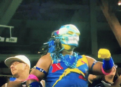 Man In Colorful Costume In Front Of Basketball Court 2014 GIF