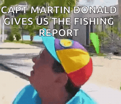 Man In Colorful Hat Says Capt Martin Donald Gives Us The Fishing Report GIF