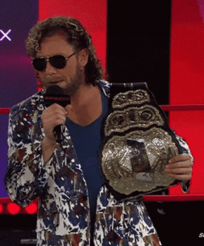 Man In Colorful Jacket Holding Wrestling Championship Belt GIF