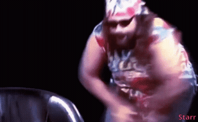 Man In Colorful Shirt Dancing In Dark Room With Word Starr GIF
