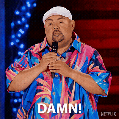 Man In Colorful Shirt Holding Microphone Saying Damn GIF