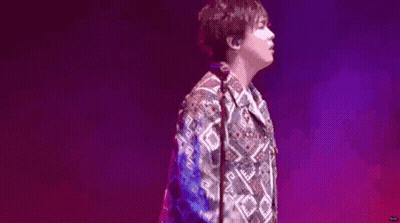 Man In Colorful Shirt On Stage GIF