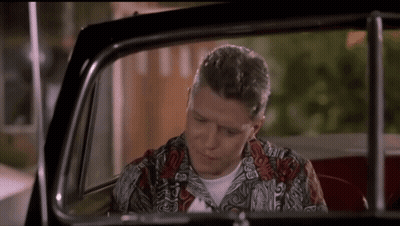 Man In Colorful Shirt Sitting In Car GIF