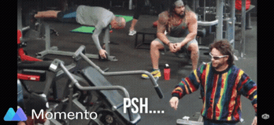 Man In Colorful Sweater In Front Of Gym Machine Saying Momento GIF