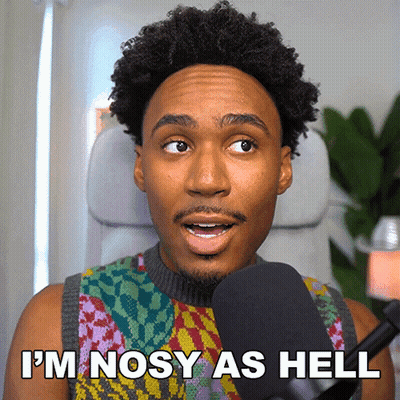 Man in Colorful Sweater Saying Im Nosy As Hell
