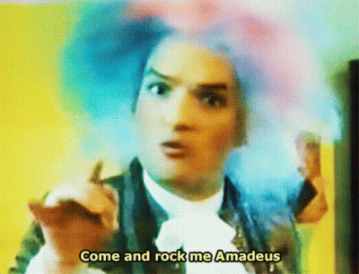 Man In Colorful Wig Says Come And Rock Me Amadeus GIF