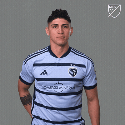 Man In Compass Minerals Jersey Holding Red Card GIF