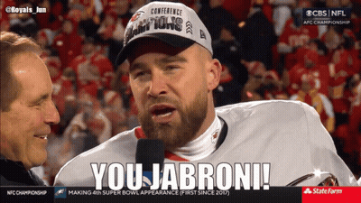 Man In Conference Champions Hat Interviewed GIF