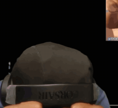 Man In Corsair Hat And Headphones Covering Face GIF