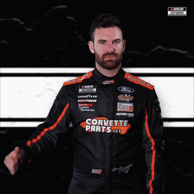 Man In Corvette Parts Uniform Black And White GIF