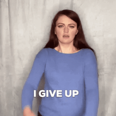 Man In Costume Holding I Forfeit Shirt GIF