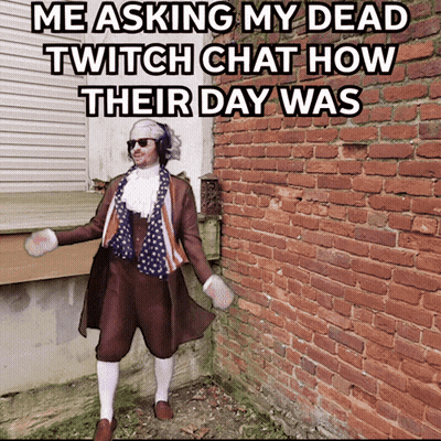 Man In Costume In Front Of Brick Wall GIF