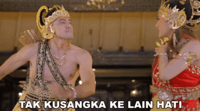 Man In Costume Standing Beside Woman Tak Kusangka Ke Lain Hati GIF