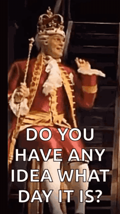Man In Costume With Crown Holding Cane And Sword GIF