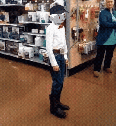 Man In Cowboy Boots And Baseball Cap In Store GIF