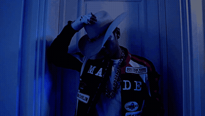 Man in Cowboy Hat and Bandana