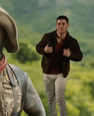 Man In Cowboy Hat And Bandana Running GIF