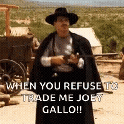 Man In Cowboy Hat And Cape Holding Gun GIF