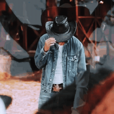 Man In Cowboy Hat And Denim Jacket GIF