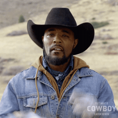 Man In Cowboy Hat And Denim Jacket GIF