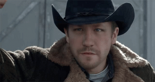 Man In Cowboy Hat And Fur Coat GIF