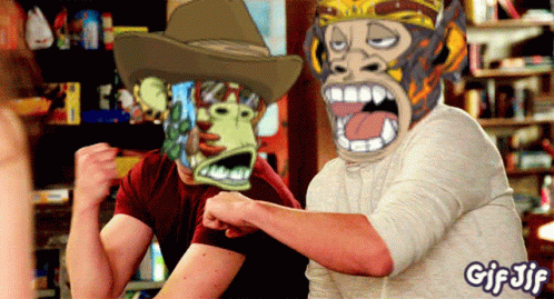 Man In Cowboy Hat And Monkey Mask GIF