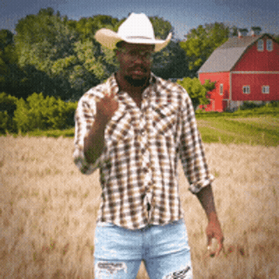 Man In Cowboy Hat And Plaid Shirt Giving Middle Finger GIF