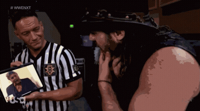 Man In Cowboy Hat And Referee Holding Self Pictures GIF