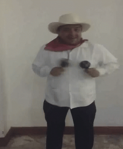 Man In Cowboy Hat And Scarf GIF