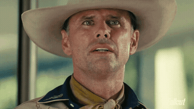 Man In Cowboy Hat And Scarf Saying Fallout GIF