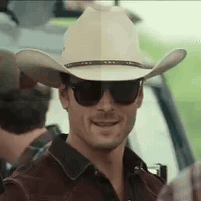 Man In Cowboy Hat And Sunglasses Smiling GIF
