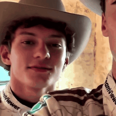 Man In Cowboy Hat And TeamViewer Shirt GIF