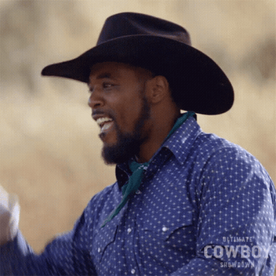 Man In Cowboy Hat And Ultimate Cowboy Showdown Shirt GIF
