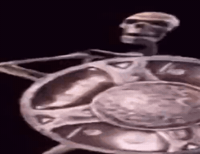 Man In Cowboy Hat And Vest Holding Gun GIF