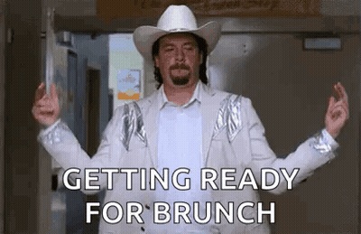 Man In Cowboy Hat And White Suit GIF