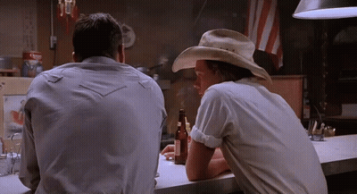 Man In Cowboy Hat At Bar With Beer GIF
