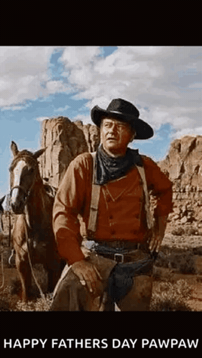 Man In Cowboy Hat Beside Horse In Desert GIF
