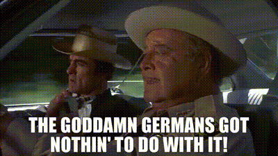 Man In Cowboy Hat Driving Car With Man In Suit GIF