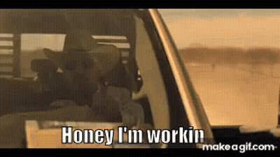 Man In Cowboy Hat Driving Truck GIF